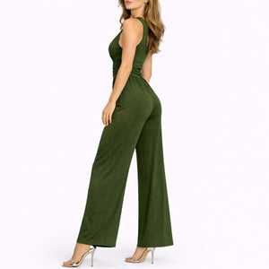 Green jumpsuit worn by a model on a white background
